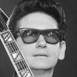 roy orbison birthday, nee roy kelton orbison, nickname the caruso of rock, the big o nickname, roy orbison 1965, american songwriter, singer, songwriters hall of fame, rock, and roll hall of fame, grammy awards, 1950s hit rock songs, trying to get to you, only the lonely knokw the way i feel, blue angel, im hurtin, 1960s rock singles, running scared, crying, dream baby how long must i dream, the crowd, working for the man, in dreams, falling, blue bayou, pretty paper, its over, oh pretty woman, goodnight, lana, 1980s hit rock songs, you got it, end of the line, traveling wilburys, 50 plus birthdays, over age 50 birthdays, age 50 and above birthdays, celebrity birthdays, famous people birthdays, april 23rd birthday, born april 23 1936, died december 6 1988, celebrity death