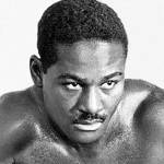 ezzard charles, nee ezzard mack charles, nickname cincinnati cobra, ezzard charles 1951, african american professional boxer, amateur featherweight boxing, 1939 chicago golden gloves featherweight champion, 1949 national boxing association heavyweight champion 1950, defeated joe louis, defeated jersey joe walcott, 1954 rocky marciano boxing matches, musician, double bass player, friends rocky marciano, friend muhammad ali, international boxing hall of fame, 50 plus birthdays, over age 50 birthdays, age 50 and above birthdays, celebrity birthdays, famous people birthdays, july 7th birthdays, born july 7 1921, died may 28 1975, celebrity deaths