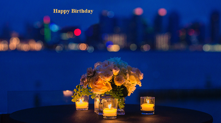 happy birthday wishes, birthday cards, birthday card pictures, famous birthdays, city lights, candles, white roses, romantic dinner