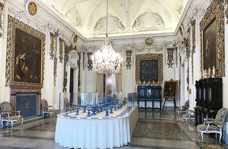 dining room, isola bella palazzo, borromean summer palace, glass chandelier, 18th century place setting, paintings, borromea palazzo