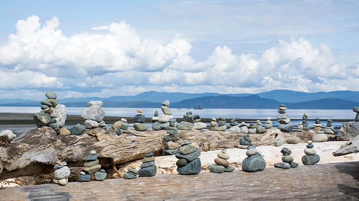 parksville, vancouver island, british columbia, sandy beach, mountains, inukshuk, getaway, holidays, travel, destinations, vacation, trip, tour, cold weather,
